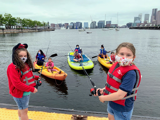 Kids with kayaks at dock picture